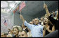 President George W. Bush, Mrs. Laura Bush and daughter Barbara Bush join the fans at the National Aquatics Center as they cheer on U.S. swimmer Michael Phelps as he swam his world-record setting 400-Meter Individual Medley event Sunday, Aug. 10, 2008, in Beijing. White House photo by Eric Draper