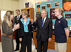President Bush talks with a group of people