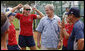 President George W. Bush visits with the U.S. Women's Softball team Saturday, Aug. 9, 2008, at their Beijing practice field at Fengtai Complex. Calling the team the "Gold Medal Champs," the President said, "It's good for the world to have girls playing softball and these women are going to show girls how to win." White House photo by Eric Draper