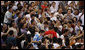 U.S. Olympic Men's Basketball Team member Kobe Bryant is surrounded by fans as he arrives to attend the U.S. Women's Olympic Basketball Team's match Saturday, Aug. 9, 2008, against the Czech Republic team at the Beijing 2008 Summer Olympics Games. White House photo by Eric Draper