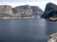 Granite cliffs rise from Hetch Hetchy Reservoir