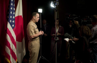 Chairman of the Joint Chiefs of Staff Navy Adm. Michael G. Mullen answers questions at a press availability with local media following at a town hall meeting with service members assigned to Camp Zama, Sagamihara, Japan, Nov. 8, 2007. Defense Dept. phot by U.S. Navy Petty Officer 1st Class Chad McNeeley