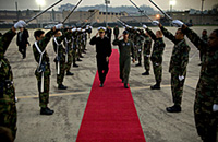 U.S. Air Force Brig. Gen. Harold W. "Punch" Moulton II, vice commander of the 7th Air Force, escorts U.S. Navy Adm. Michael G. Mullen, chairman of the Joint Chiefs of Staff, through an Osan Air Base honor guard saber arch before departing the base, concluding a three day visit to Korea. Defense Dept. phot by U.S. Navy Petty Officer 1st Class Chad McNeeley