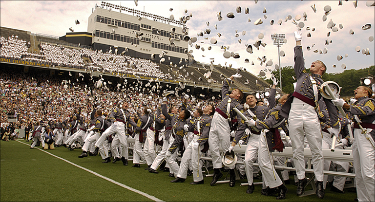 Students at the Army's U.S. Military Academy participate in the traditional hat toss, a ritual shared by the U.S. Naval Academy and U.S. Air Force Academy. The hat toss symbolizes students’ transition from cadet or midshipman to military officer.   Courtesy photo.