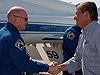 Launch Director Mike Leinbach greets STS-124 Commander Mark Kelly.