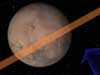 artist rendering uses an arrow to show the predicted path of the asteroid on Jan. 30, 2008, and the orange swath indicates the area it is expected to pass through. Mars may or may not be in its path.