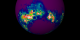 A view of the topography of the southern hemisphere of Mars, using a color table designed to highlight the topography at the south pole.  White colors indicate elevations in excess of 3012 meters, red shows elevations between 2500 and 3012 meters, yellow shows elevations from 2450 to 2500 meters, dark cyan shows elevations from 2150 to 2450 meters, dark violet shows elevations from 320 to 2150 meters.