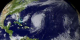 This visualization shows hurricanes Fabian and Isabel using GOES data. The clouds are extruded to give a sense of depth. 