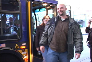 photo: riders getting off bus