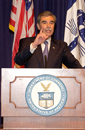 Secretary Carlos Gutierrez at podium