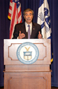 Secretary Carlos Gutierrez at podium