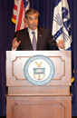 Secretary Carlos Gutierrez at podium