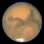 Mars was photographed by the Hubble Space Telescope in August 2003 as the planet passed closer to Earth than it had in nearly 60,000 years.