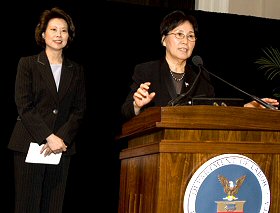 Secretary of Labor Elaine L. Chao is introduced by Women's Bureau Director Shinae Chun (DOL photo) 