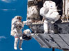 Astronauts Robert L. Curbeam, Jr. and Christer Fuglesang