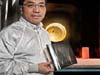 Astrophysicist Will Zhang and his X-ray mirror