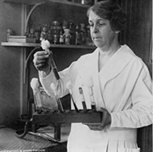 Woman holding test tubes