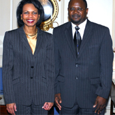 Photo of Secretary of State Condoleezza Rice with  Humphrey Fellowship alumnus Arnold Tsunga