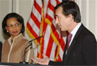 Secretary Rice looks on as French Foreign Minister Philippe Douste-Blazy speaks at microphone after their meeting, London, United Kingdom, June 23, 2005. State Department photo by Richard Lewis.