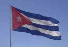 Image of Cuban flag, waving in the breeze.