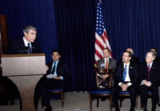 Gutierrez addressing award recipients from podium. Click for larger image.