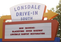 The historic Lonsdale Drive-in sign heralding restored habitat and bikeway . (photo credit: USFWS).
