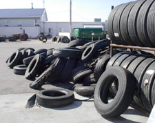 Photo: stacks of new and used tires.