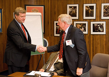 Assistant Secretary of OSHA Edwin G. Foulke, Jr. congratulates Phil Martini, President of C.R. Meyers and Sons for being the first OSHA Challenge Participant to achieve VPP Star recognition.