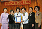 Secretary Chao joins Eun Sook Kim Lee (third from right), Chongwon K. Cho (second from left), Shin Ok Lee (far left), Kate Kyung S. Kim (far right), and DOL Women's Bureau Director Shinae Chun (second from right).