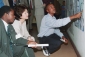 Secretary Chao listens to a former child soldier at the Belgian Red Cross Child Soldier Facility describing his life of combat and terror as a child soldier. 