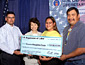 Secretary Chao (2nd from left), Floyd Kirk, Jr. (far left), Acting General Manager, Dakota Western Organization; Tasina Gill (2nd from right); and James Crawford, Chairman, Sisseton Wahpeton Oyate (SWO) Tribe.