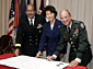 Secretary Chao; Rear Admiral Adam M. Robinson, Jr. (left), commander of the National Naval Medical Center; and Major General Kenneth L. Farmer (right).