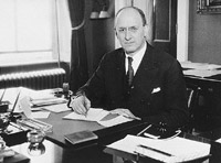 Portrait of Henry Morgenthau Jr. at his desk in the U.S. Department of the Treasury. Henry Morgenthau, Jr. (1891-1967), served as Secretary of the Treasury under Franklin Roosevelt, and as such, was the highest ranking Jewish official in the administration. In January 1944, after receiving a report prepared by his subordinates on "the acquiescence of this government in the murder of the Jews," Morgenthau wrote a personal report to the President which led to the establishment of the War Refugee Board. After the war he became Chairman of the United Jewish Appeal and served in that capacity until 1950. Washington D.C., 1941-1944.