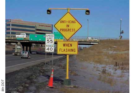 Signs like this one notify motorists in Minneapolis, MN, when anti-icing activities are in progress on local bridges.