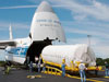 A second stage Centaur engine is delivered from the mouth of a Russian cargo plane on June 6, 2005 at Kennedy Space Center.