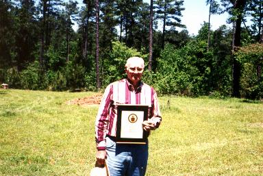 A 15 year Length of Service award was presented to H. P. Elrod of Naples, Tx. 