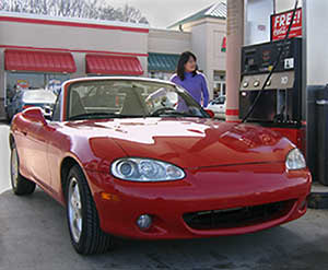 Person refueling car