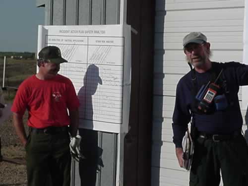 picture of fire officials conducting a morning briefing