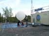 Researchers prepare to launch a balloon from Yellowknife, Northwest Territories, to collect weather and ozone data.