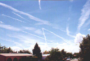 Image of contrails early in the day.
