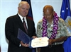 U.S. Defense Secretary Robert M. Gates, left, presents the Outstanding Civilian Career Service award to Mr. Seikichi Kaneshiro during his retirement ceremony on Anderson Air Force Base, Guam Friday, May 30, 2008.  Kaneshiro retired after 66 years of federal service.