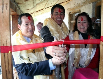 Deputy Assistant Secretary of State Evan Feigenbaum (left), U.S. Embassy in Nepal DCM Randy Berry, and USAID/Nepal Mission Director Beth Paige cut the inaugural ribbon at Radio Kailash.