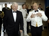 Defense Secretary Robert M. Gates is greeted by Adm. Eric Olson, Commander of U.S. Special Operations Command upon his arrival at the convention center in Tampa, Fla., to speak at the Special Operations Mess Night dinner and reception, May 21, 2008.  