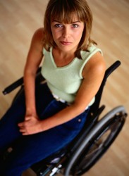 Young woman in wheelchair.