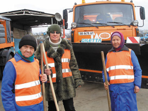 Mariya Duda (left) with her iron 'assistant'