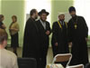 Father Grigoriy Chekmenyov, Rabbi Nison Mendl Ruppo, Imam-Khatab Marat Zhalyaletdinov, and Father Mikhail Nasonov of Kostoma discuss the day's event