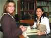 Zana Perla (l) checks on the status of her case in Sarajevo's Municipal Court