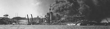 The USS Shaw on fire after the attack.