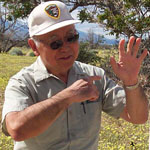 Park Volunteer and former internee Saburo Sasaki talking to visitors. NPS Photo.