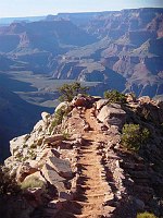 LOOKING DOWN WINDY RIDGE ON THE S KAIBAB TRAIL, GRAND CANYON N.P., DURING THE SPRING EQUINOX AT 4:45 PM. NPS PHOTO. 